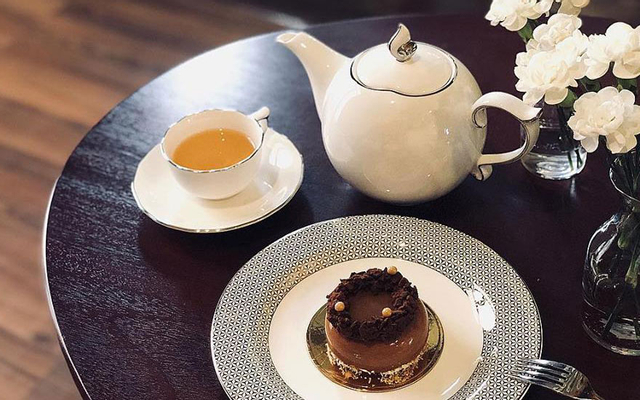 Bánh ngọt nằm trong trà thơm và ngon bên trên Palais des Douceurs